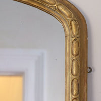a continuous carved giltwood guilloche border of elongated oval reserves on the Mid-19th Century Giltwood Pier and Overmantel Mirror by John Westley Birmingham