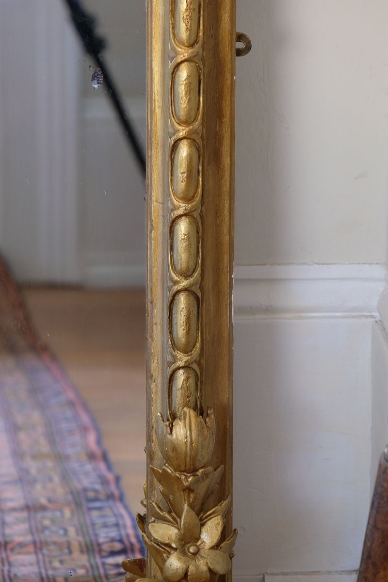 a continuous carved giltwood guilloche border of elongated oval reserves on the Mid-19th Century Giltwood Pier and Overmantel Mirror by John Westley Birmingham