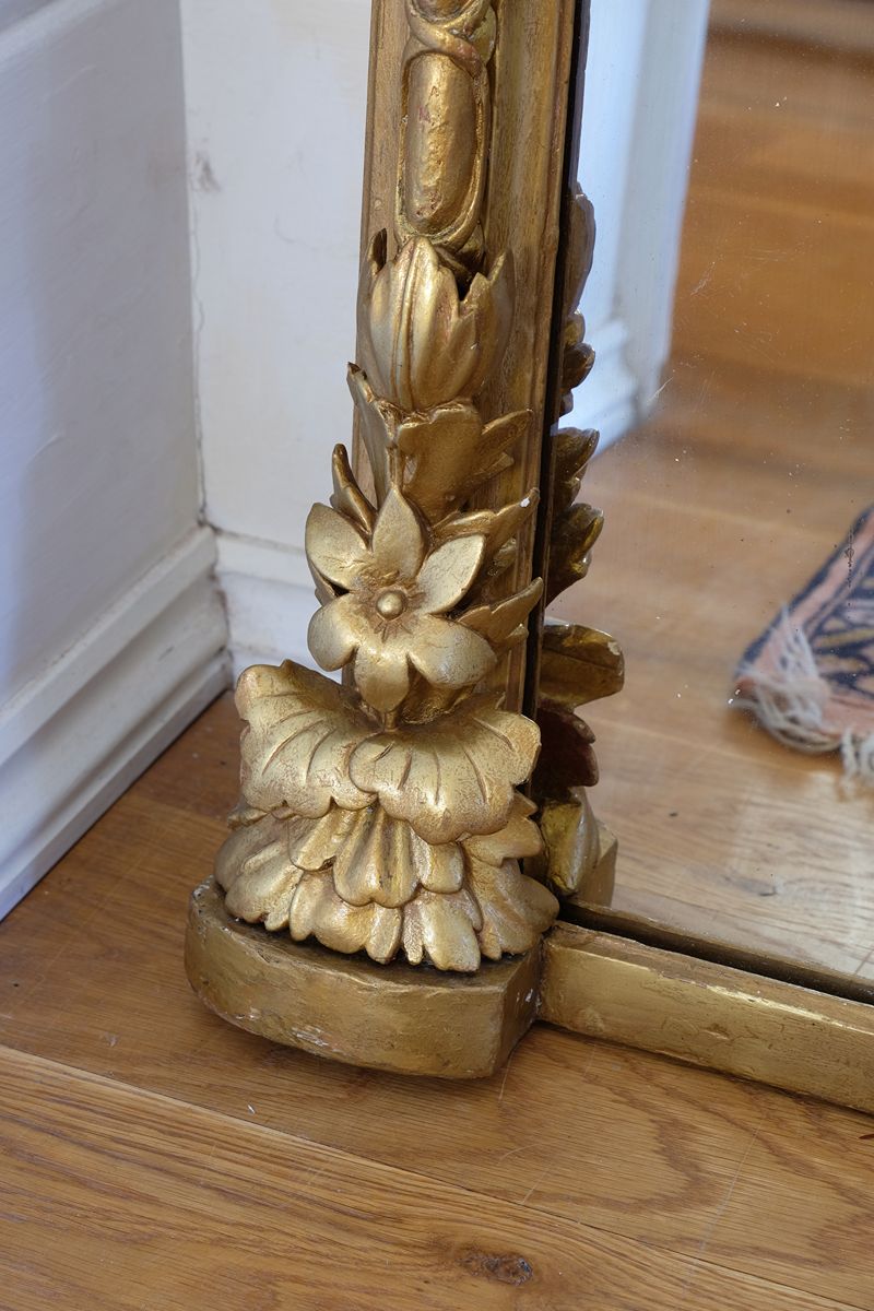 Close up of the  Exceptionally expressive carved flower heads, leaves and foliate terminals on the Mid-19th Century Giltwood Pier and Overmantel Mirror by John Westley Birmingham