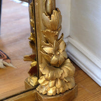 Close up of the  Exceptionally expressive carved flower heads, leaves and foliate terminals on the Mid-19th Century Giltwood Pier and Overmantel Mirror by John Westley Birmingham