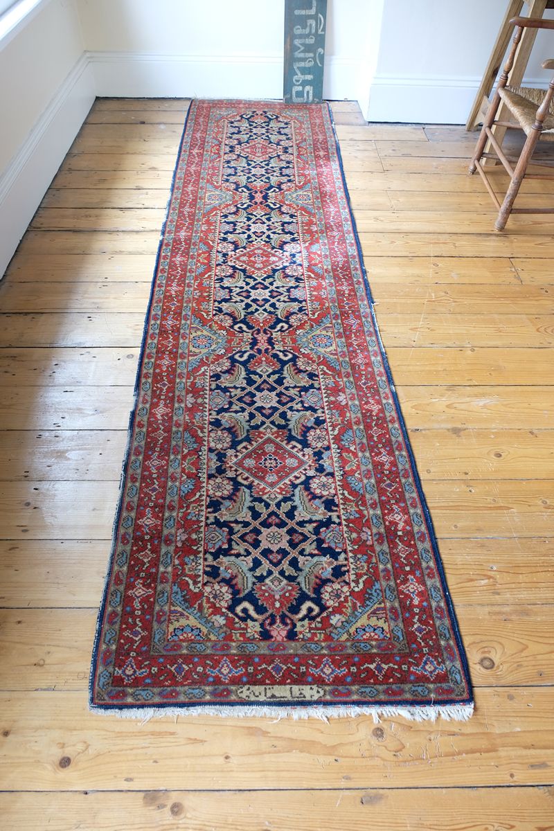Full-length view of the early 20th-century inscribed North-West Persian runner