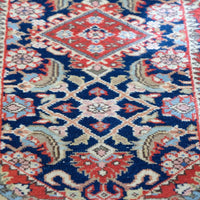 Multiple floral borders and indigo field of the North-West Persian runner