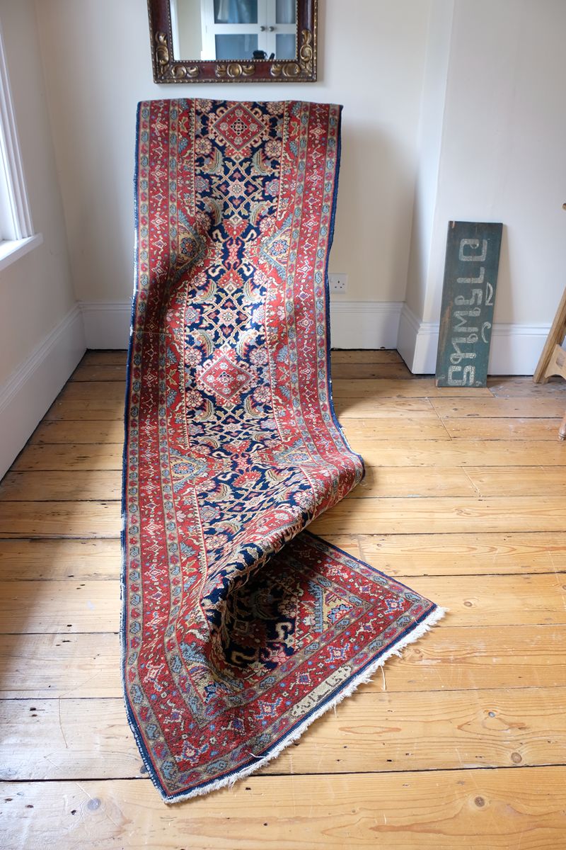 Hand-knotted Persian hallway runner measuring 302 × 72 cm