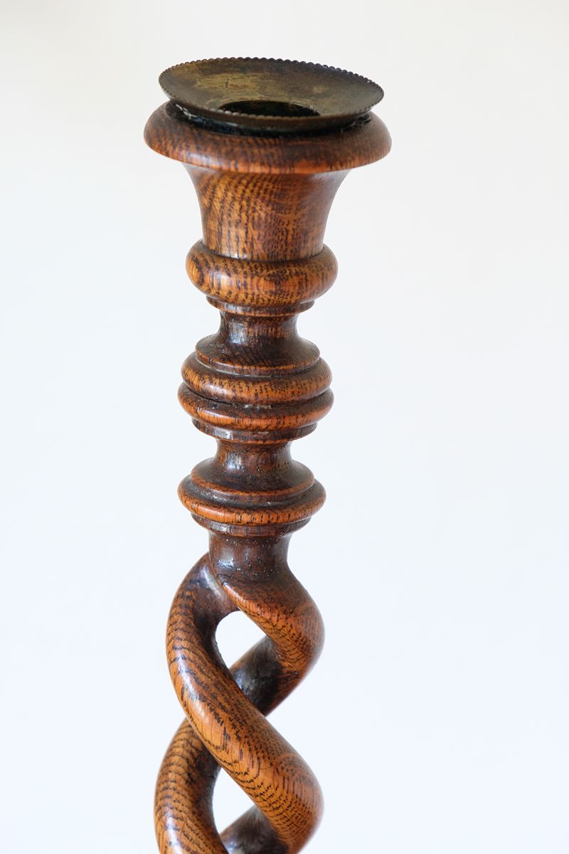Antique English oak open barley-twist candlestick dating to circa 1900