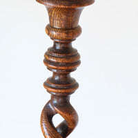 Antique English oak open barley-twist candlestick dating to circa 1900