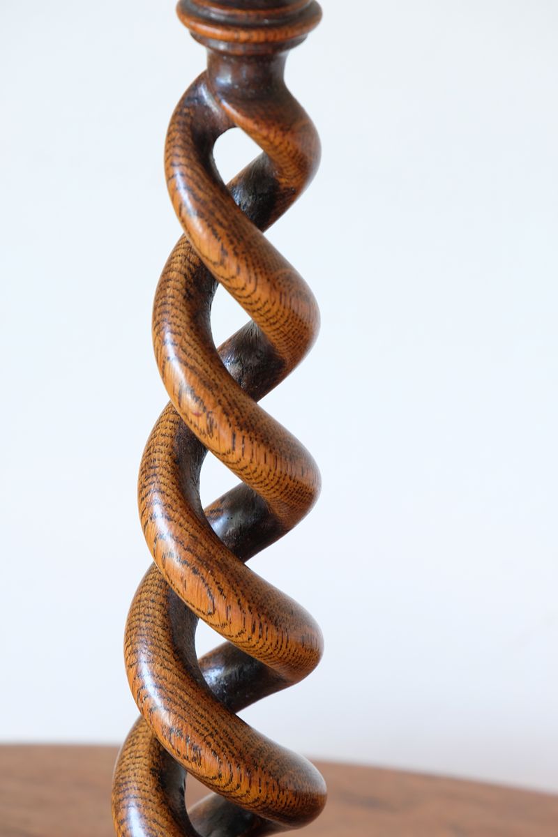 Antique English oak open barley-twist candlestick dating to circa 1900