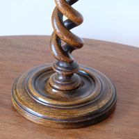 Antique English oak open barley-twist candlestick dating to circa 1900