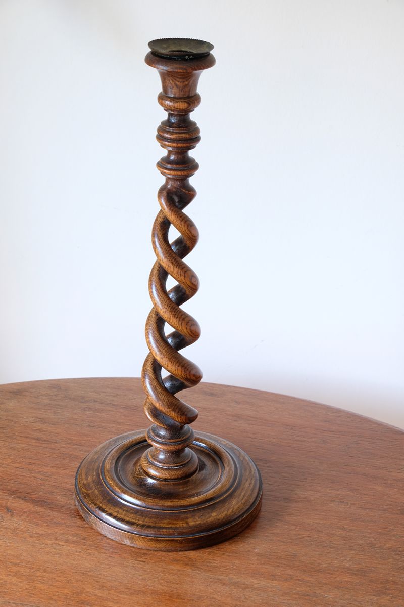 Antique English oak open barley-twist candlestick dating to circa 1900