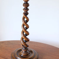 Antique English oak open barley-twist candlestick dating to circa 1900