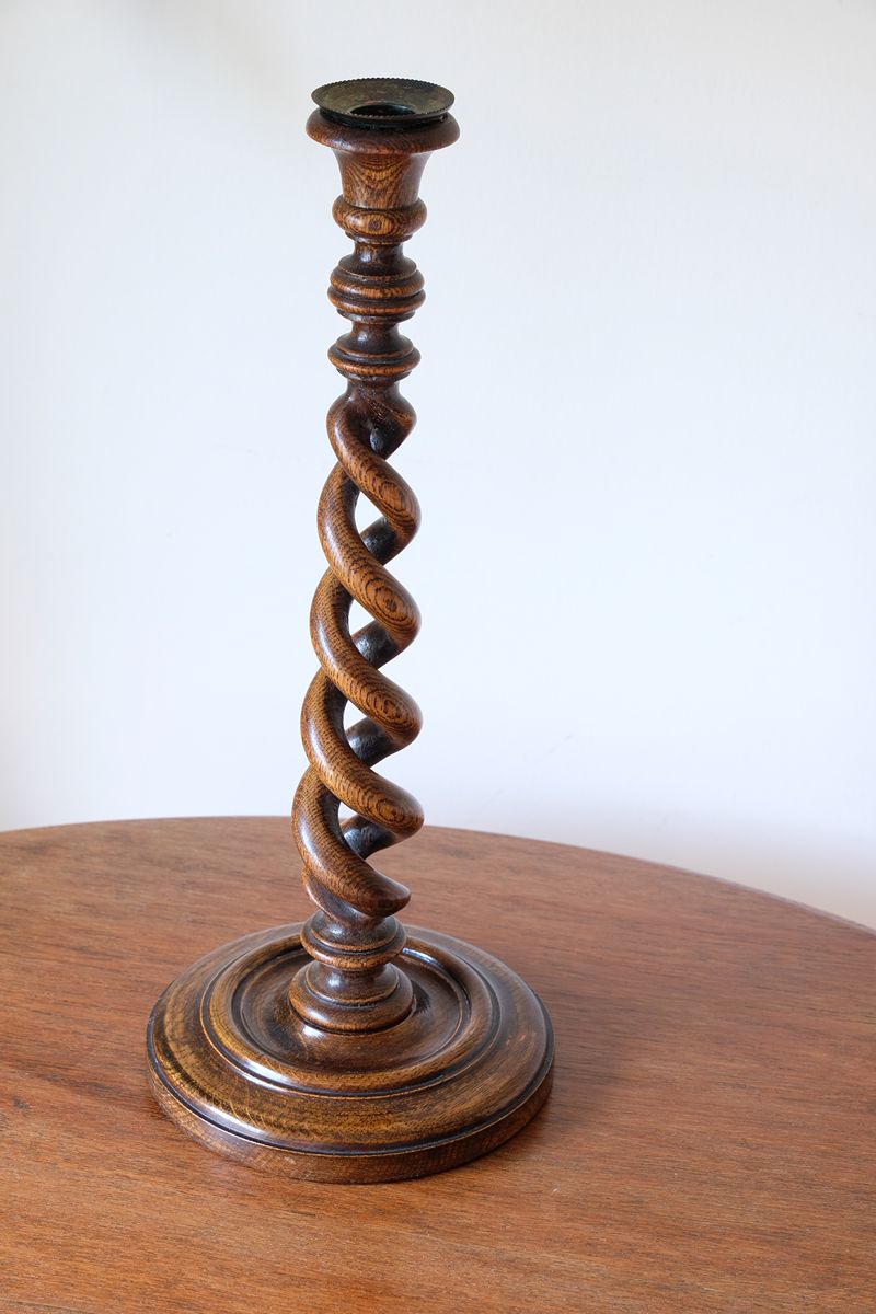 Antique English oak open barley-twist candlestick dating to circa 1900