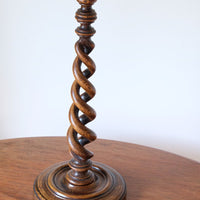 Antique English oak open barley-twist candlestick dating to circa 1900