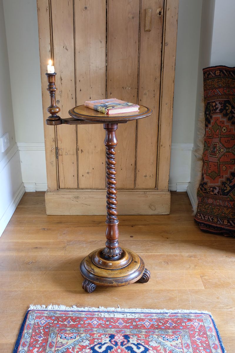 Mid-Victorian burr walnut candle stand with fixed candle arm and barley-twist column
