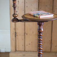 Mid-Victorian burr walnut candle stand with fixed candle arm and barley-twist column