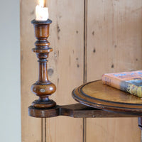 Close up of the fixed arm on the Mid-Victorian burr walnut candle stand with fixed candle arm and barley-twist column