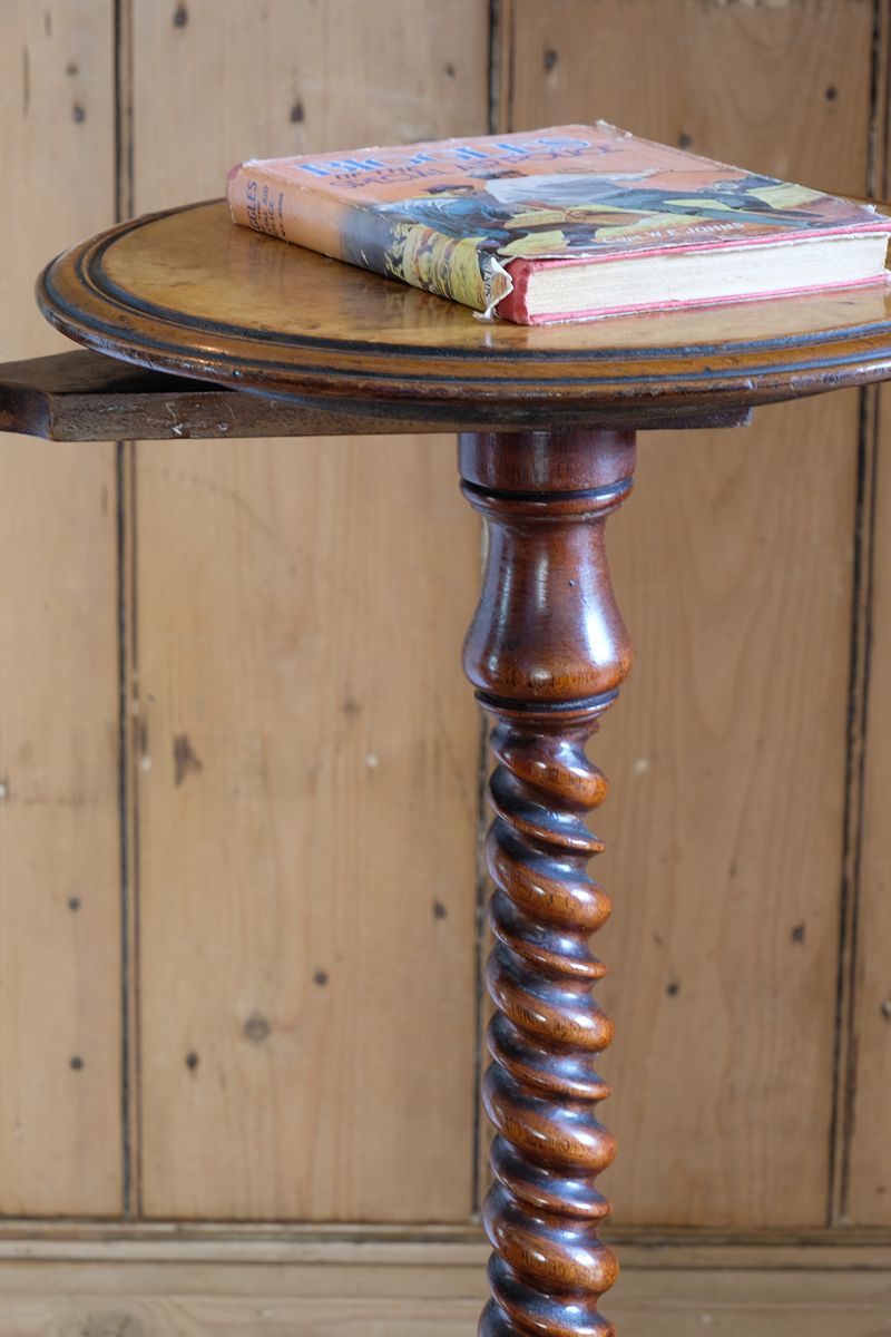 Mid-Victorian burr walnut candle stand with fixed candle arm and barley-twist column