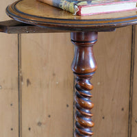 Mid-Victorian burr walnut candle stand with fixed candle arm and barley-twist column