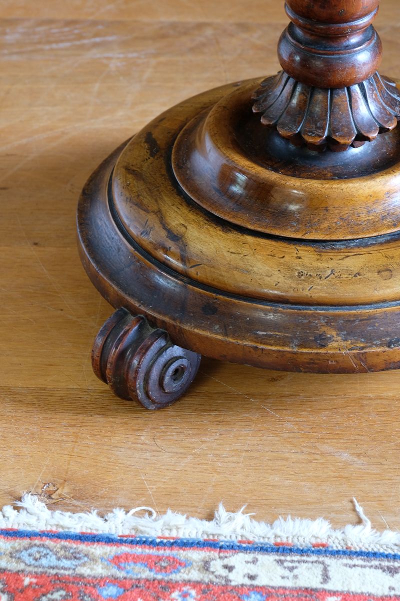 Mid-Victorian burr walnut candle stand with fixed candle arm and barley-twist column