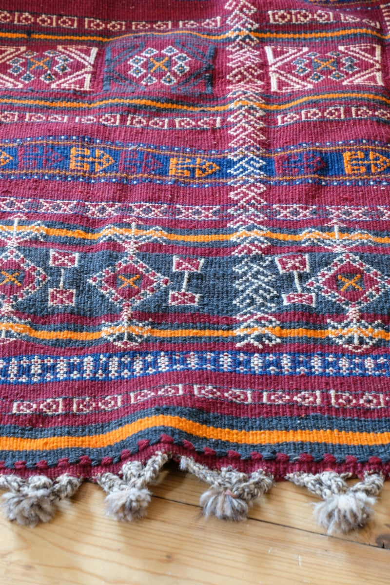 Monumental mid-20th century Moroccan Berber flatweave rug with red and indigo geometric patterns