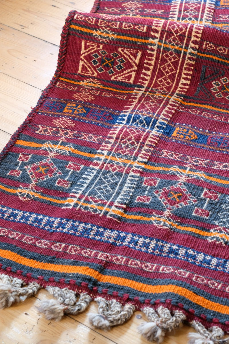 Monumental mid-20th century Moroccan Berber flatweave rug with red and indigo geometric patterns