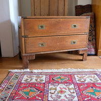 Early to mid-19th century mahogany two-drawer campaign chest viewed from the front