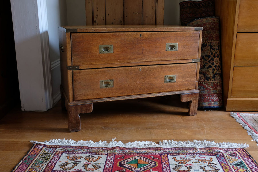 Early to mid-19th century mahogany two-drawer campaign chest viewed from the front