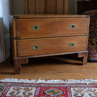 Early to mid-19th century mahogany two-drawer campaign chest viewed from the front