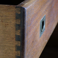 Open drawers of mahogany campaign chest showing dovetailed timber construction