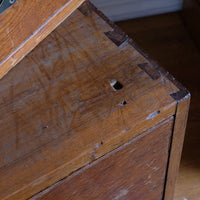 Hand-cut external carcass dovetails and locating aperture on the lower campaign chest section.