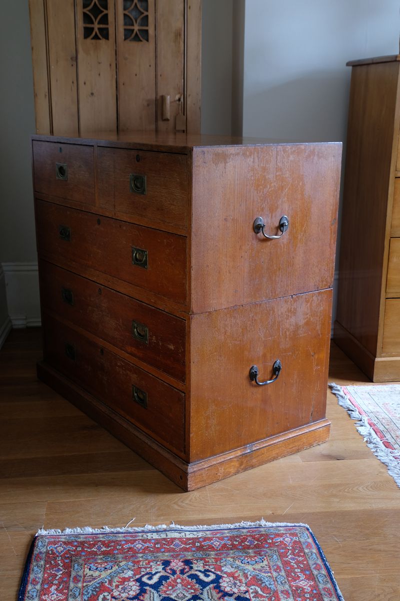 Mid-19th century camphor wood two-part campaign chest with five drawers and recessed brass handles.