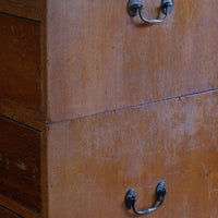 Mid-19th century camphor wood two-part campaign chest with five drawers and recessed brass handles.