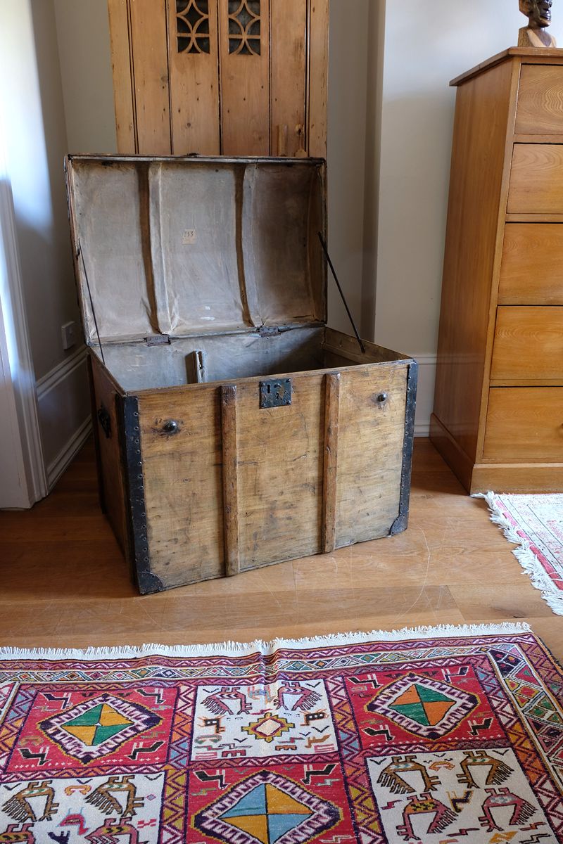 Antique Victorian pine domed trunk with iron straps and timber knock bars, circa 1880