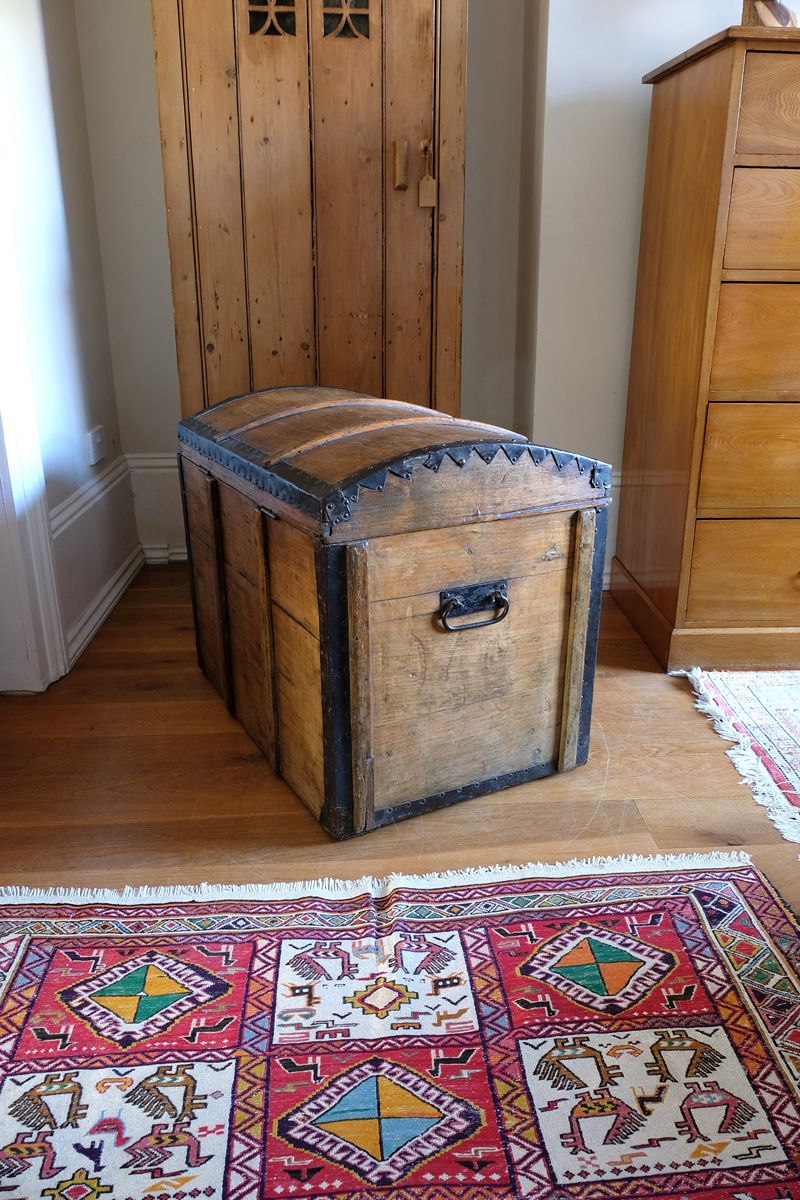 Antique Victorian pine domed trunk with iron straps and timber knock bars, circa 1880