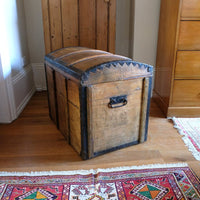 Antique Victorian pine domed trunk with iron straps and timber knock bars, circa 1880