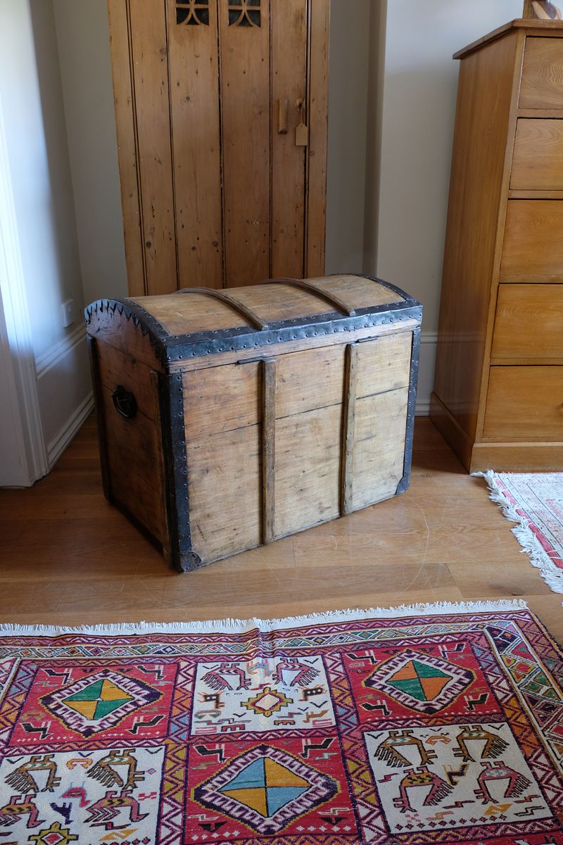 Antique Victorian pine domed trunk with iron straps and timber knock bars, circa 1880