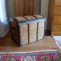 Antique Victorian pine domed trunk with iron straps and timber knock bars, circa 1880