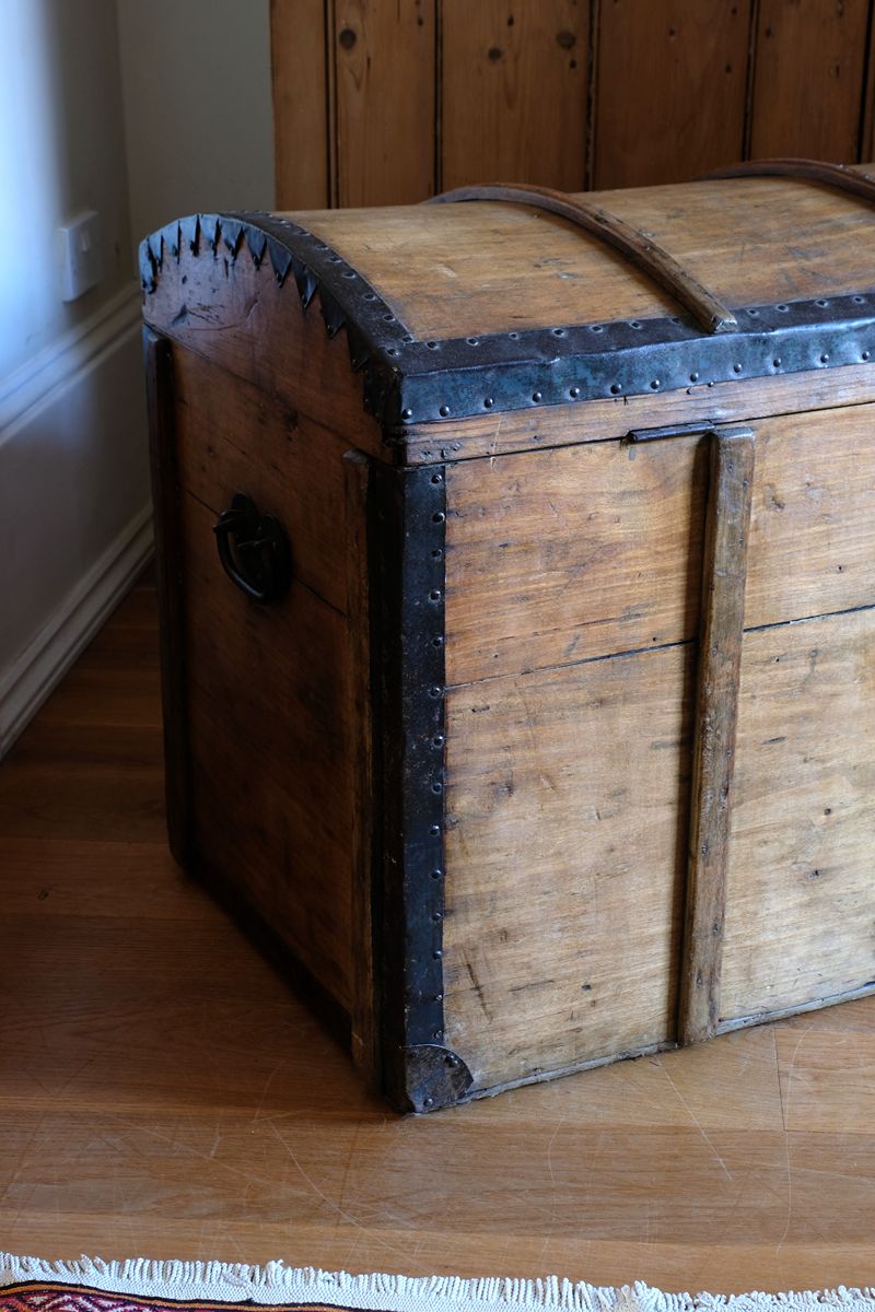 Antique Victorian pine domed trunk with iron straps and timber knock bars, circa 1880