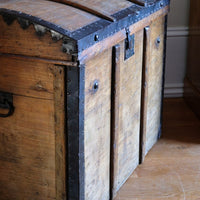 Antique Victorian pine domed trunk with iron straps and timber knock bars, circa 1880