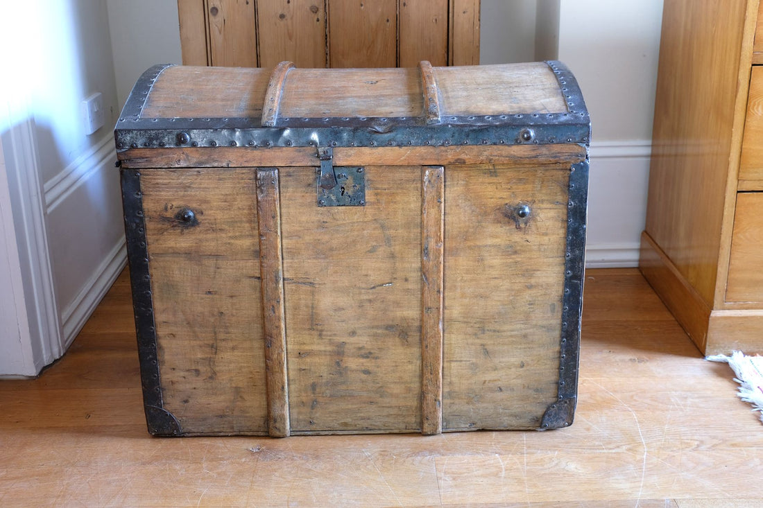Antique Victorian pine domed trunk with iron straps and timber knock bars, circa 1880