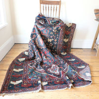 Early 20th century Persian Qashqai wool rug with indigo field, three medallions and blue-green corners, 244 × 159 cm