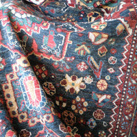 Early 20th century Persian Qashqai wool rug with indigo field, three medallions and blue-green corners, 244 × 159 cm