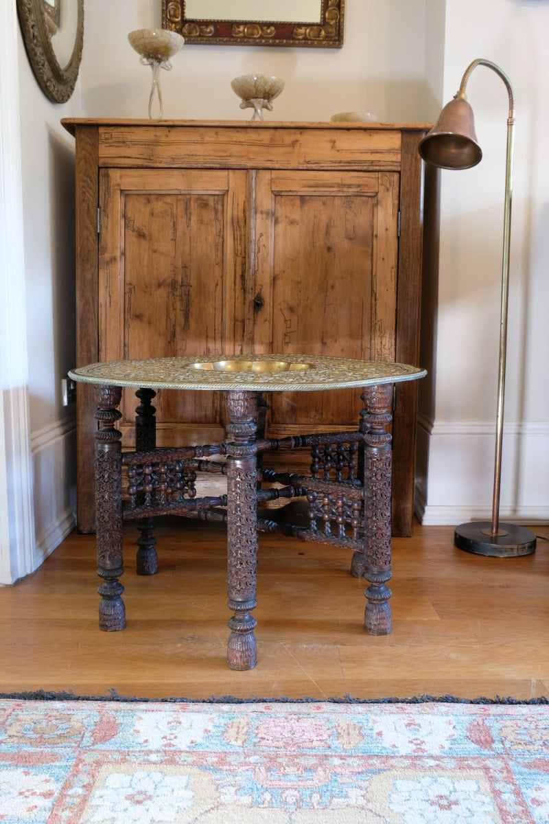 Anglo Indian Intricately Carved Table With A Decorative Brass Top