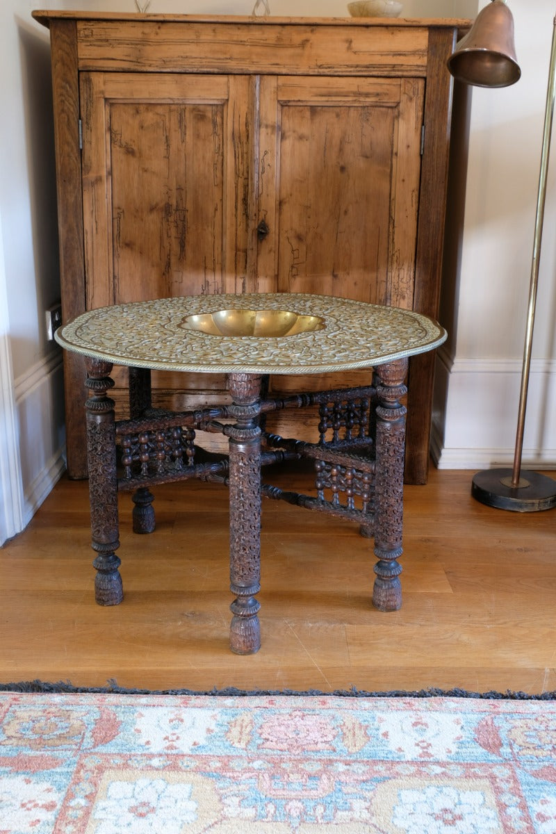 Anglo Indian Intricately Carved Table With A Decorative Brass Top