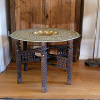 Anglo Indian Intricately Carved Table With A Decorative Brass Top