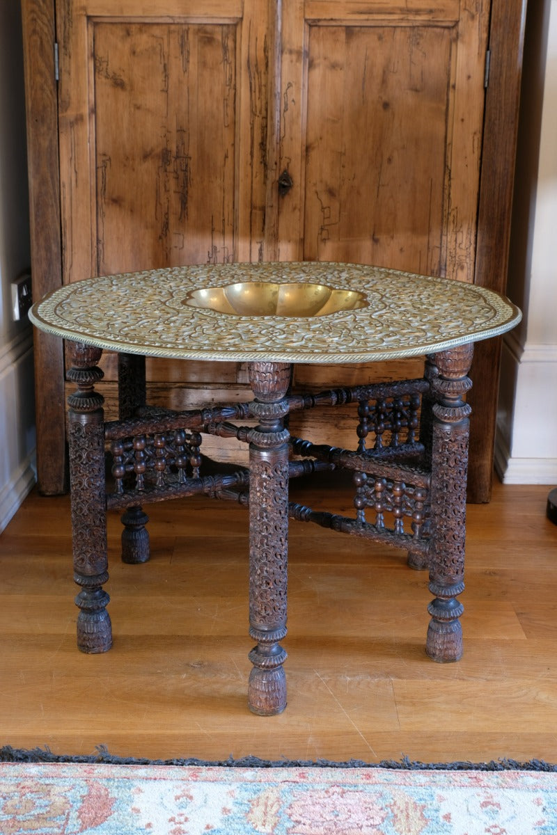 Anglo Indian Intricately Carved Table With A Decorative Brass Top