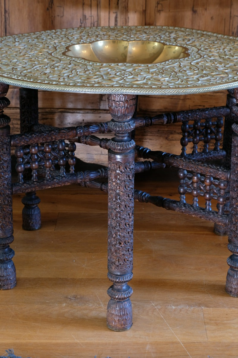 Anglo Indian Intricately Carved Table With A Decorative Brass Top