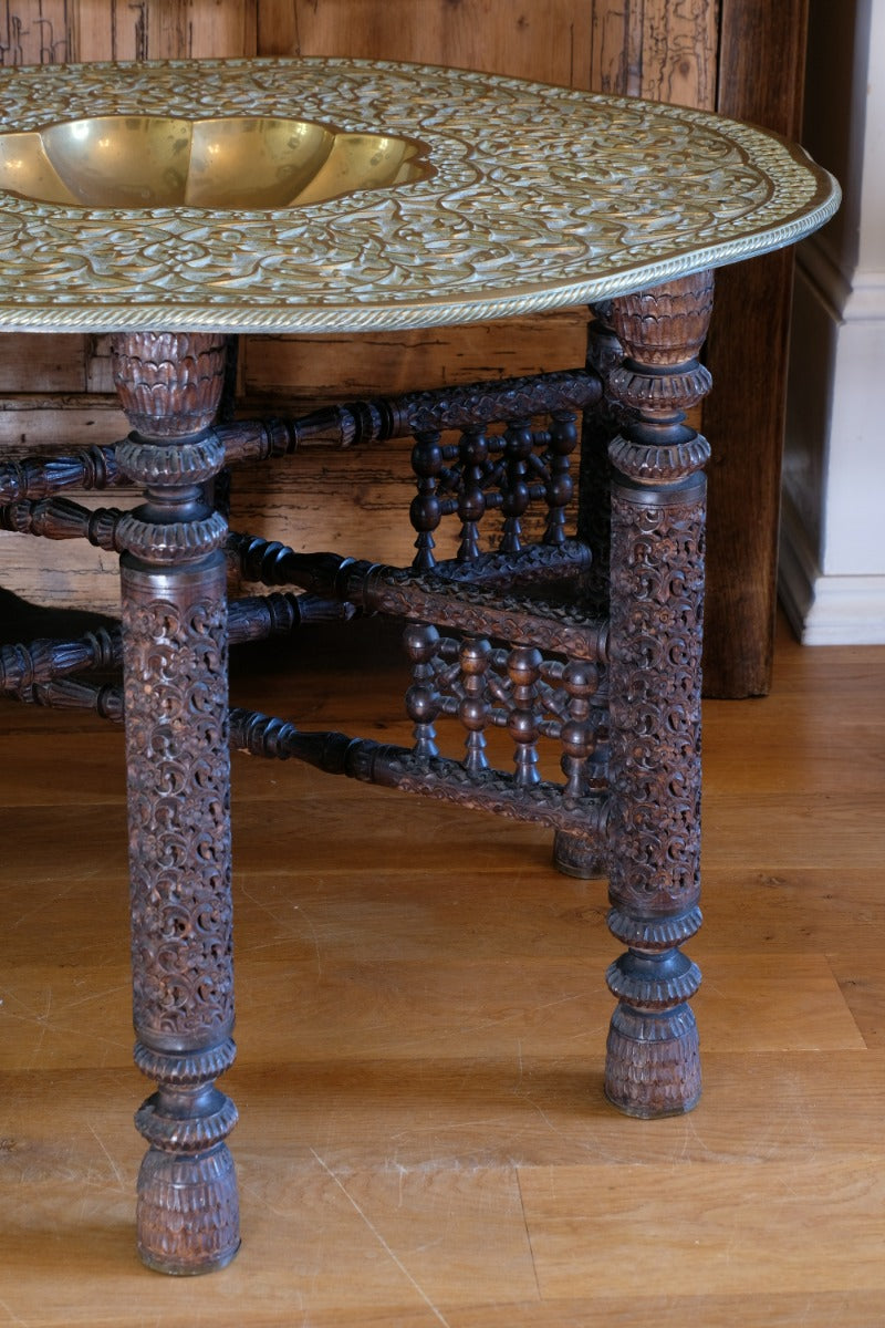 Anglo Indian Intricately Carved Table With A Decorative Brass Top