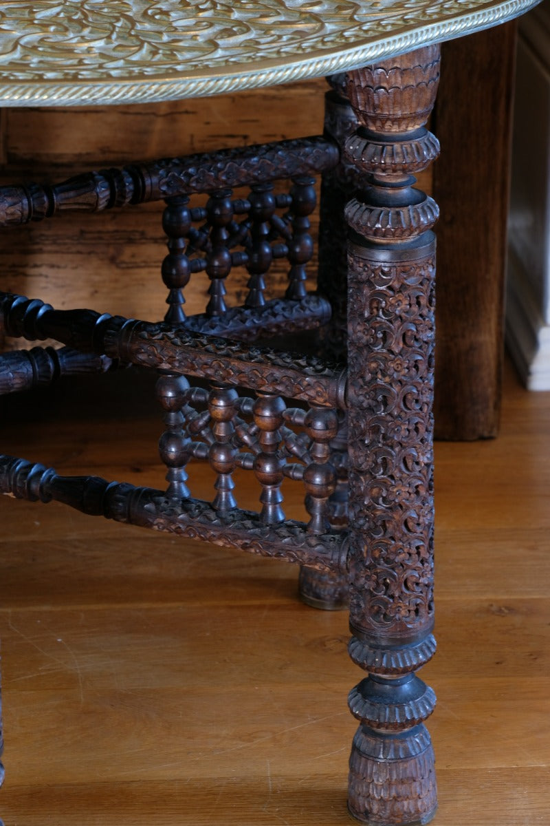 Anglo Indian Intricately Carved Table With A Decorative Brass Top