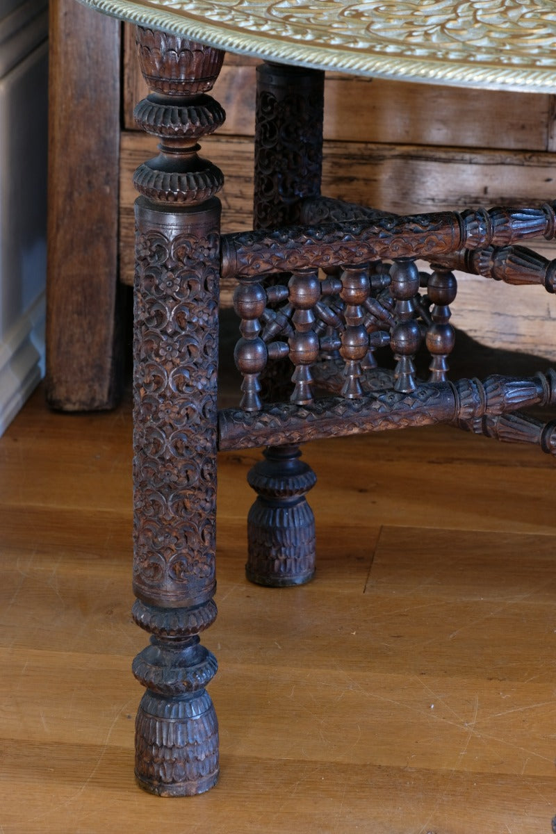 Anglo Indian Intricately Carved Table With A Decorative Brass Top