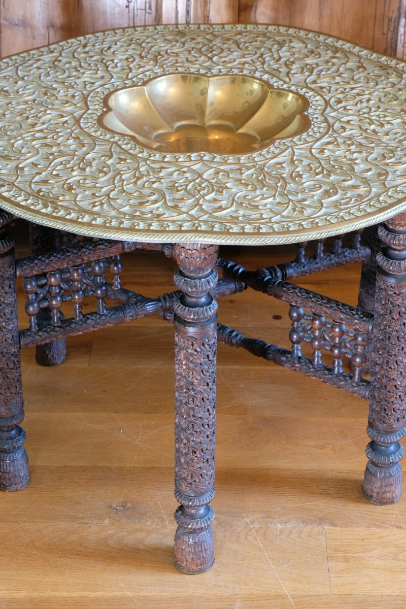 Anglo Indian Intricately Carved Table With A Decorative Brass Top