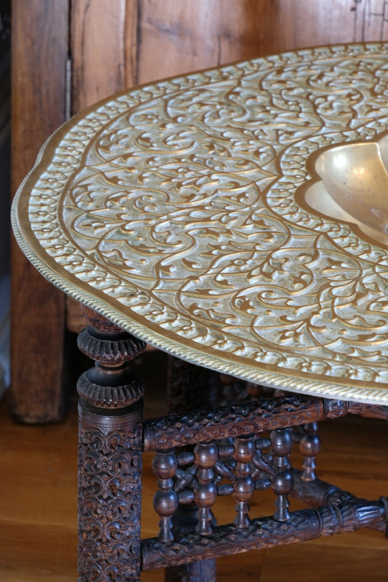 Anglo Indian Intricately Carved Table With A Decorative Brass Top